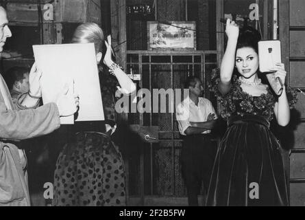 Woman of the 1960s. A woman is posing in typical 1960s bullet bra