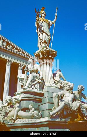 Vienna, Austria. The marble Pallas Athene fountain outside the Austria Parliament building on the Ringstrasse. Completed in 1902. Stock Photo