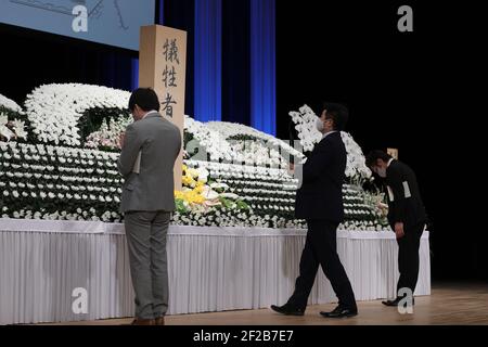 Tokyo, Japan. 11th Mar, 2021. People mourn for the victims of the Great East Japan Earthquake and Tsunami in Fukushima, Japan, March 11, 2021. Credit: Du Xiaoyi/Xinhua/Alamy Live News Stock Photo
