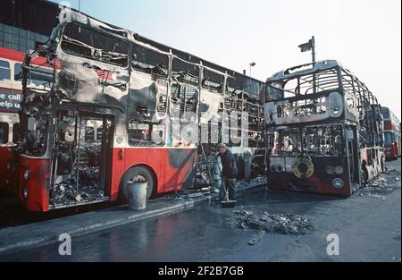 BELFAST, UNITED KINGDOM - AUGUST 1976. petrol bombed Belfast City bus in depot during The Troubles, Northern Ireland, 1970s Stock Photo