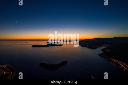 Aerial drone shot of post sunset over Adriatic sea view from Babin Kuk hill in Dubrovnik Croatia summer Stock Photo