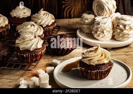 Cupcake on a dessert table background. Stock Photo