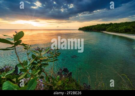 Tropical beach at Sunset, Moyo island, Sumbawa, West Nusa Tenggara, Indonesia Stock Photo