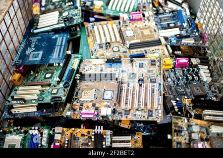 Norden, Deutschland. 13th May, 2020. Numerous circuit boards in a box of an electronic waste sorting company in Norden (Germany), 13 May 2020. Credit: dpa/Alamy Live News Stock Photo