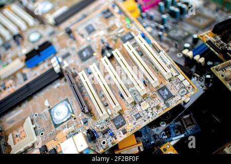 Norden, Deutschland. 13th May, 2020. Numerous circuit boards in a box of an electronic waste sorting company in Norden (Germany), 13 May 2020. Credit: dpa/Alamy Live News Stock Photo