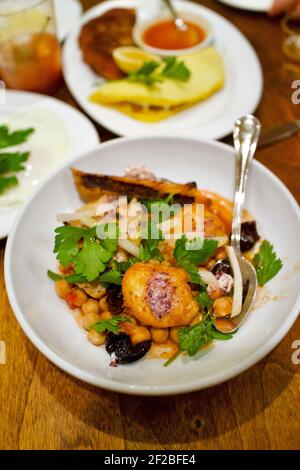 Prune restaurant in the East Village in New York City. Started by Gabrielle Hamilton. Spicy Stewed Chickpeas. Stock Photo