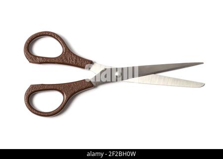 Brown scissors on white Stock Photo