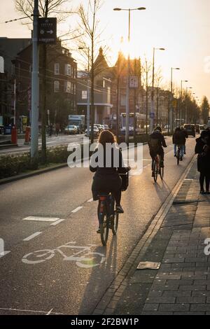 Cyclists on Jan Luijkenstraat, Amsterdam, Netherlands. Stock Photo