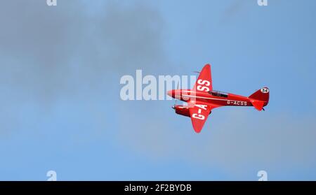 Vintage  DH88 Comet  G-ACSS  aircraft in flight. Stock Photo