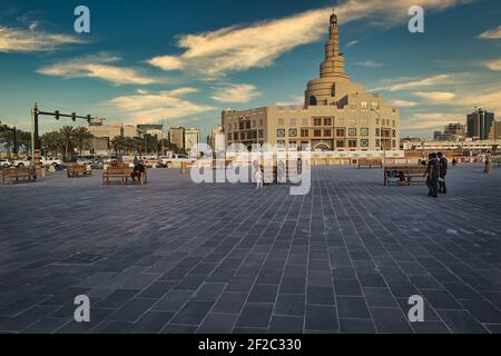 Al-Fanar Qatar Islamic Cultural Center  in Doha Qatar daylight exterior view from Souk Waqif with clouds in sky in background Stock Photo