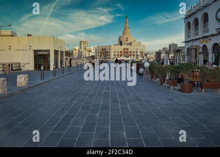 Al-Fanar Qatar Islamic Cultural Center  in Doha Qatar daylight exterior view from Souk Waqif with clouds in sky in background Stock Photo