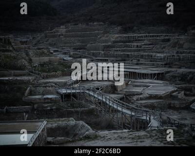 Panorama view of ancient traditional old salt flats terrace valley Salinas de Anana in Gesaltza Araba Alava Basque Country Spain Europe Stock Photo