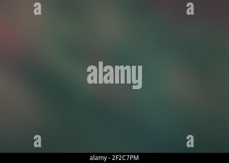 Abstract blurred background of dark green emerald color. Blurred Bokeh Christmas background. Holiday coniferous green xmas glowing backdrop. Stock Photo