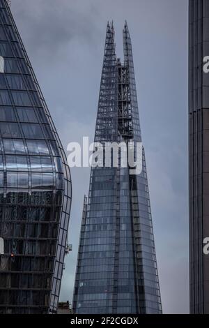 London's iconic Shard building stands amongst other London Skyscrapers in the capital's skyline, London, England, United Kingdom Stock Photo