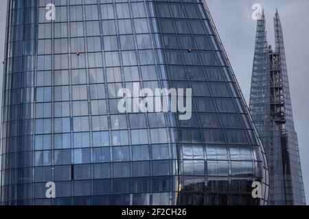 London's iconic Shard building stands amongst other London Skyscrapers in the capital's skyline, London, England, United Kingdom Stock Photo