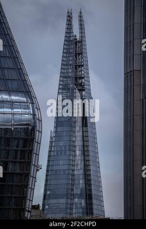 London's iconic Shard building stands amongst other London Skyscrapers in the capital's skyline, London, England, United Kingdom Stock Photo