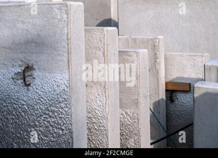 precast concrete blocks in a row at a construction site Stock Photo