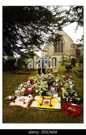 The Funeral for Capt. David Jones was held at All Saints Church in South Elkington, Lincolnshire. Wreaths being laid in the church grounds after the ceremony.pic David Sandison 28/8/2003 Stock Photo