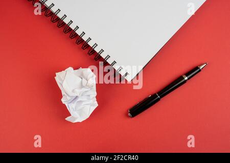 a pen and a crumpled sheet of paper Stock Photo