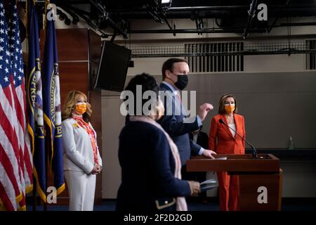United States Senator Chris Murphy (Democrat of Connecticut) offers remarks while joined by United States Representative Lucy McBath (Democrat of Georgia), left, United States Representative Sheila Jackson-Lee (Democrat of Texas), second from left, and Speaker of the United States House of Representatives Nancy Pelosi (Democrat of California), right, for a press conference on passage of gun violence prevention legislation at the U.S. Capitol in Washington, DC, Thursday, March 11, 2021. Credit: Rod Lamkey/CNP /MediaPunch Stock Photo