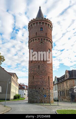 Fangelturm in Friedland (Mecklenburg-Vorpommern), round medieval fortified tower built of brick, formerly part of the city wall, also used as prison, Stock Photo