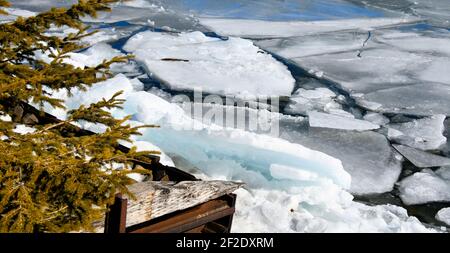 Shoreline and Lake Superior ice during spring breakup on a sunny day. Stock Photo