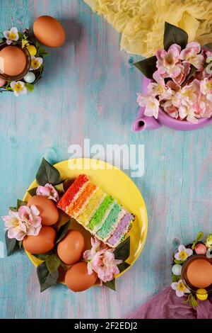Symbol of Easter eggs and colorful festive cake. Stock Photo