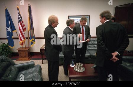 President George W. Bush Confers with Staff Members at Barksdale Air Force Base. Stock Photo