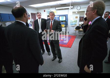 President George W. Bush Consults with Senior Staff. Stock Photo