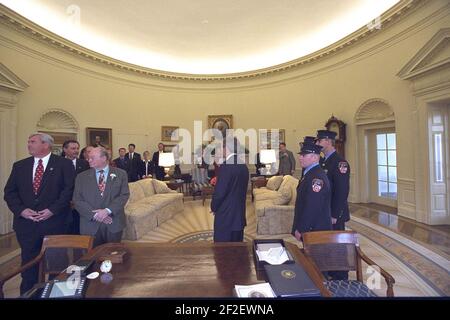 President George W. Bush Participates in an Unveiling Ceremony for a United States Postal Service Stamp Commemorating September 11th Recovery Workers. Stock Photo