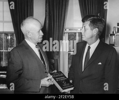 President John F. Kennedy Receives Book from General Omar N. Bradley (01). Stock Photo