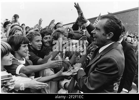 President Richard Nixon Greets a Crowd of Students outside a Building at Dwight D. Eisenhower High School in Utica, Michigan after Attending a School Dedication Ceremony. Stock Photo