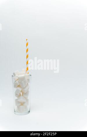 sugar in a glass with a straw cocktail sweets energy Stock Photo