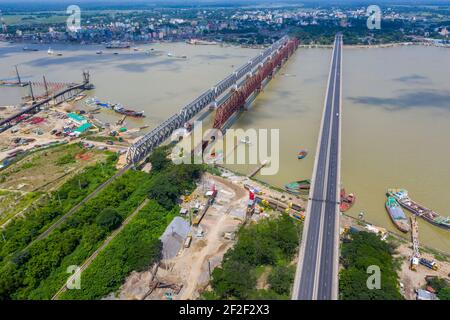 Aerial photo of Syed Nazrul Islam Bridge and two rail way bridges cross the Meghna River from Bhairab Bazar to Ashuganj. Bangladesh. Stock Photo