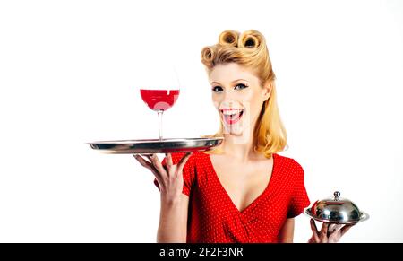 Wine presentation. Pin up waiter with alcohol and service tray. Restaurant serving. Stock Photo
