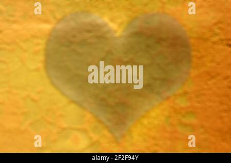 Defocused abstract background of soft brown concrete wall with love symbol for wallpaper and backdrop Stock Photo
