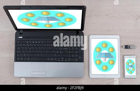 Clean energy concept shown on different information technology devices Stock Photo