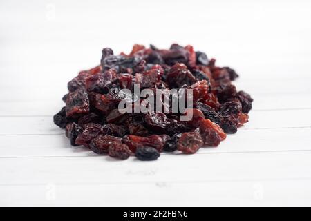 A handful of delicious dried raisins from dark grapes Stock Photo