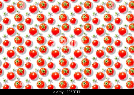 Top view of ripe red cherry tomatoes isolated on white background. Seamless pattern of fresh vegetables. Banner. Flat lay composition. Stock Photo