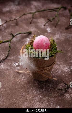 Red Easter egg painted with beetroot Stock Photo