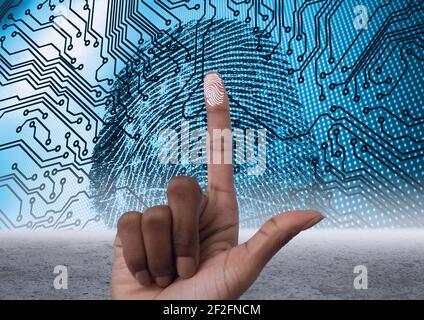 Human finger scanning over biometric scanner against microprocessor connections on blue background Stock Photo