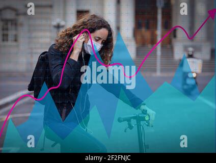 Financial data processing against caucasian woman wearing face mask sitting on scooter Stock Photo