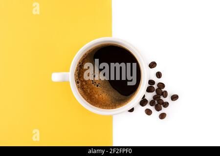 Hot coffee cup  on yellow and white background Stock Photo