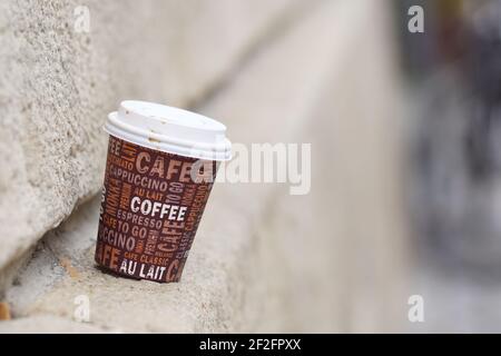 coffee time - single use coffee to go paper cup in city Stock Photo