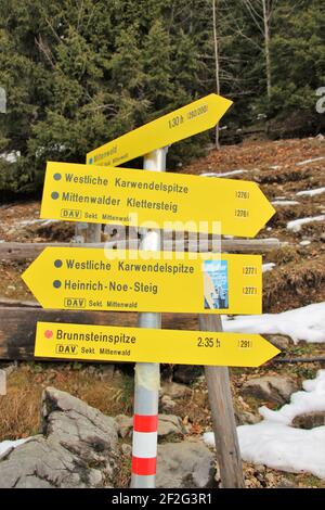 Hike to the Brunnsteinhütte in winter, signs, signposts, Germany, Bavaria, Upper Bavaria, Pre-Alps, Isar Valley, Mittenwald Stock Photo