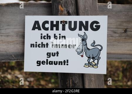 Hike to the Brunnsteinhütte in winter, warning sign, I'm not always in a good mood !, Germany, Bavaria, Upper Bavaria, Pre-Alps, Isar Valley, Mittenwald Stock Photo