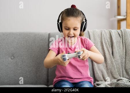 Addictive Child Kid Gamer Watching Video Game Stock Photo