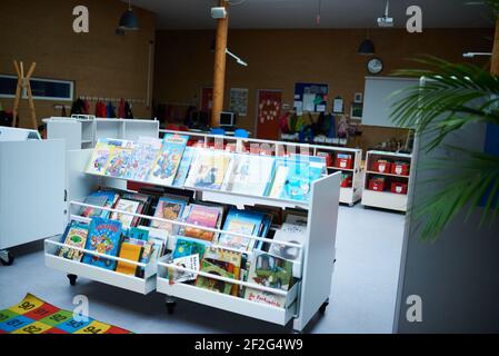 A empty small school library with a bookshelf Stock Photo