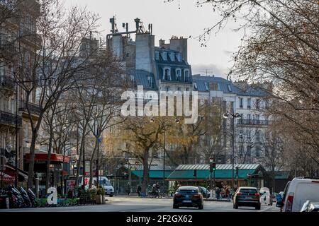 Paris, France - February 19, 2021: Beautiful buildings and typical parisian facades in the 8th district in Paris near parc Monceau Stock Photo