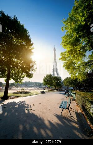 Garden in Paris near Eiffel Tower at sunny morning, France Stock Photo